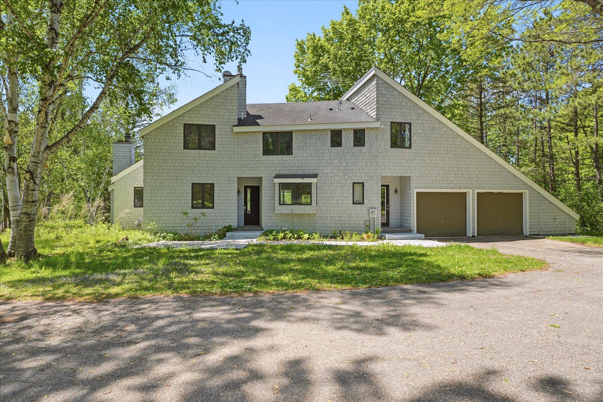 Absolutely stunning acreage estate with treelined private drive to a 7 acre piece of heaven