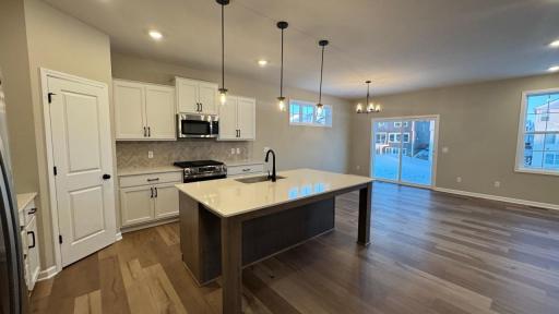 Stainless Steel Appliances, Luxury Vinyl Plank Floors and Quartz Countertops