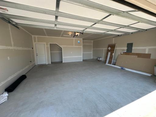 Garage with lots of extra storage including a 14x15 attic storage area.