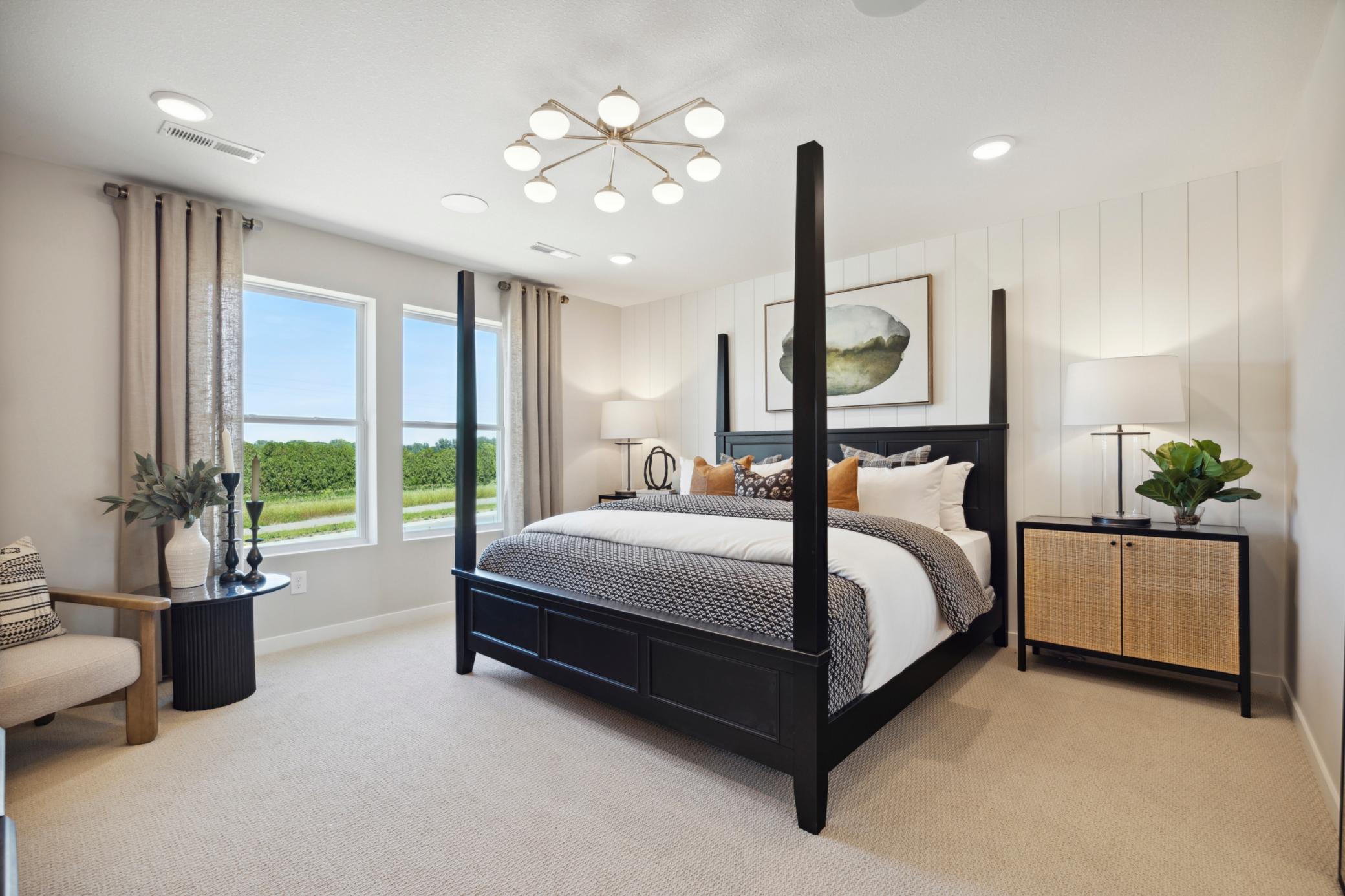 Primary Bedroom. Photo is of a similar Lowry model home.