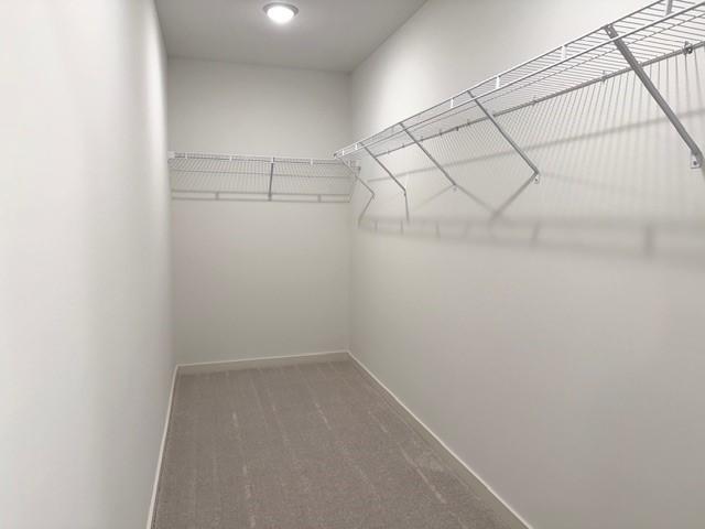 Primary Closet. Photo is of a similar Dayton home.