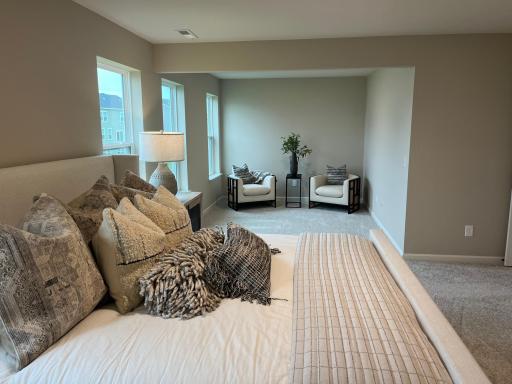 Same floorplan - staged. Owner's-suite for primary bedroom getaway