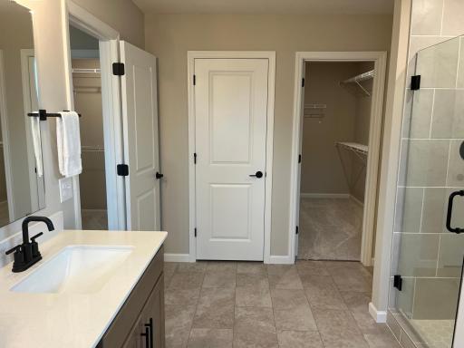 Same floorplan - staged. Water-closet for the toilet and second primary walk-in closet