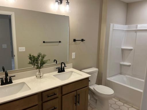 Same floorplan - staged. Secondary full-bathroom