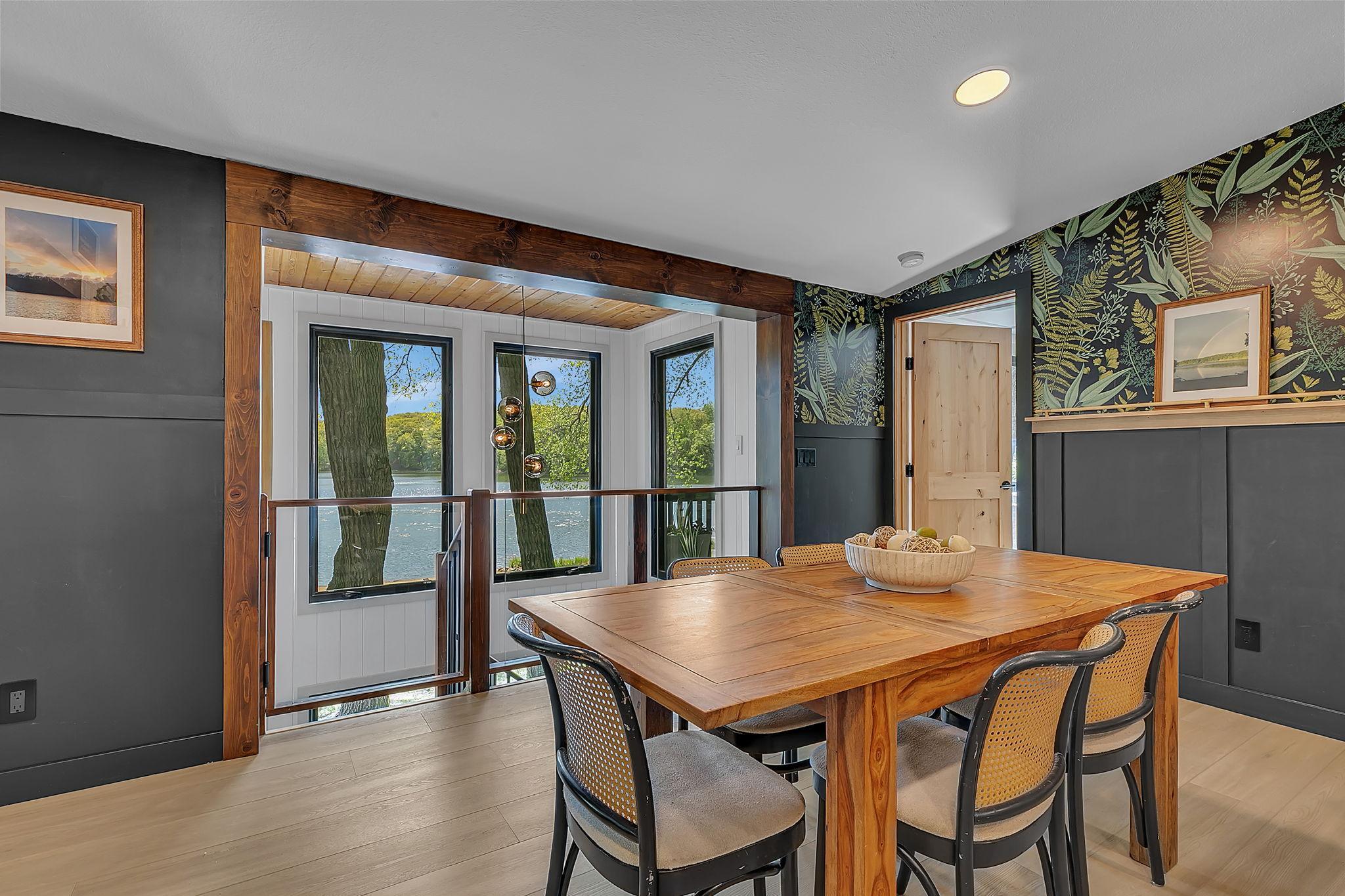 Dining area looking out above water and treeline
