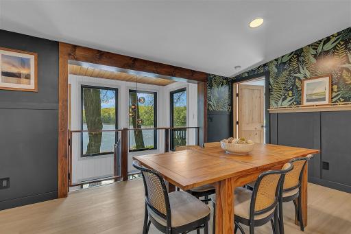 Dining area looking out above water and treeline