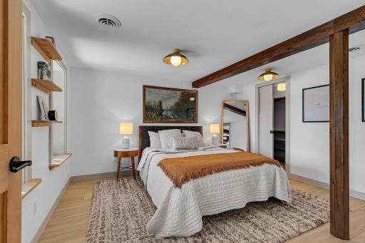Bedroom 2 with lake views and walk in closet