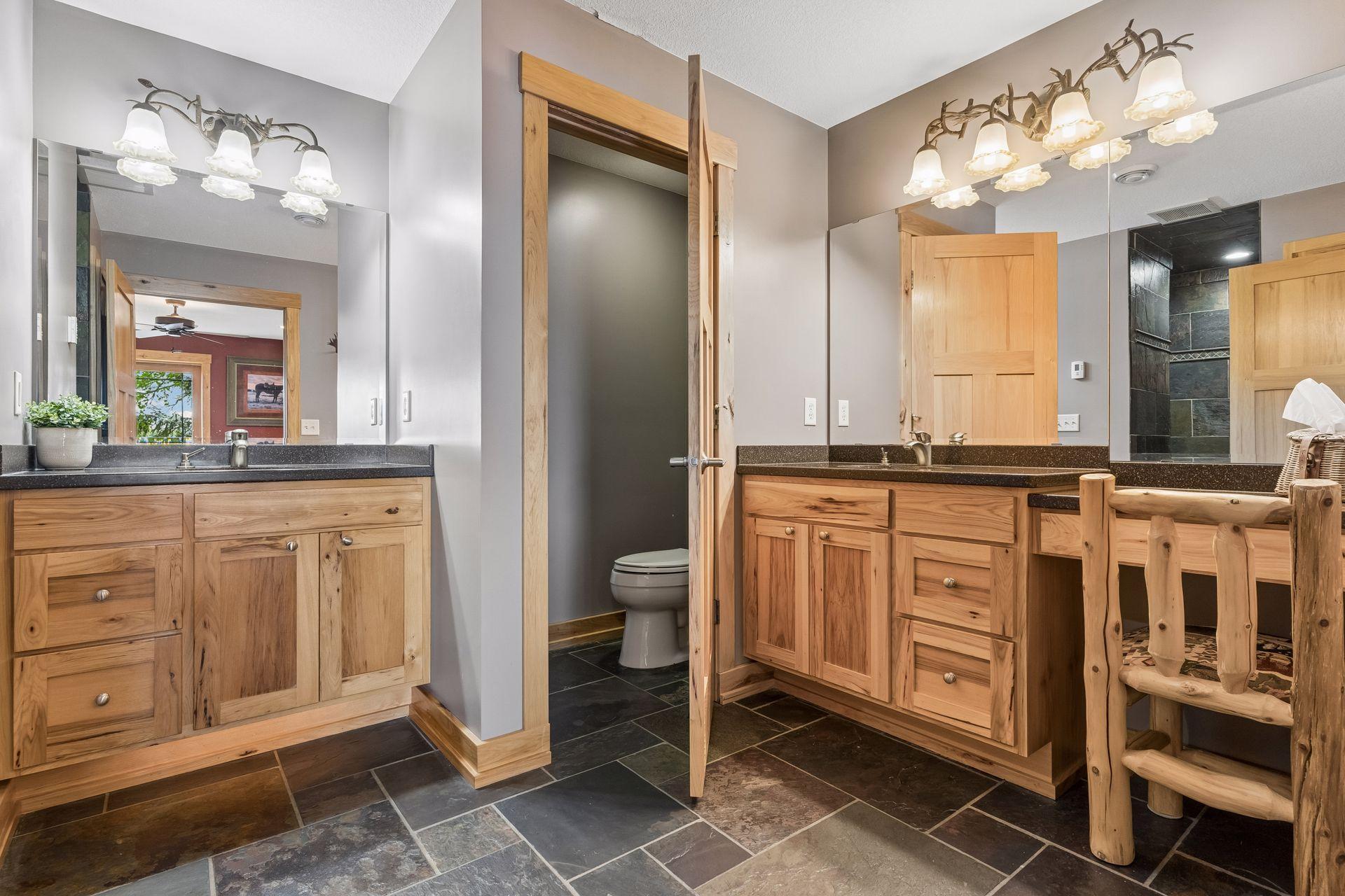 Dual Sinks and Private Toilet Area