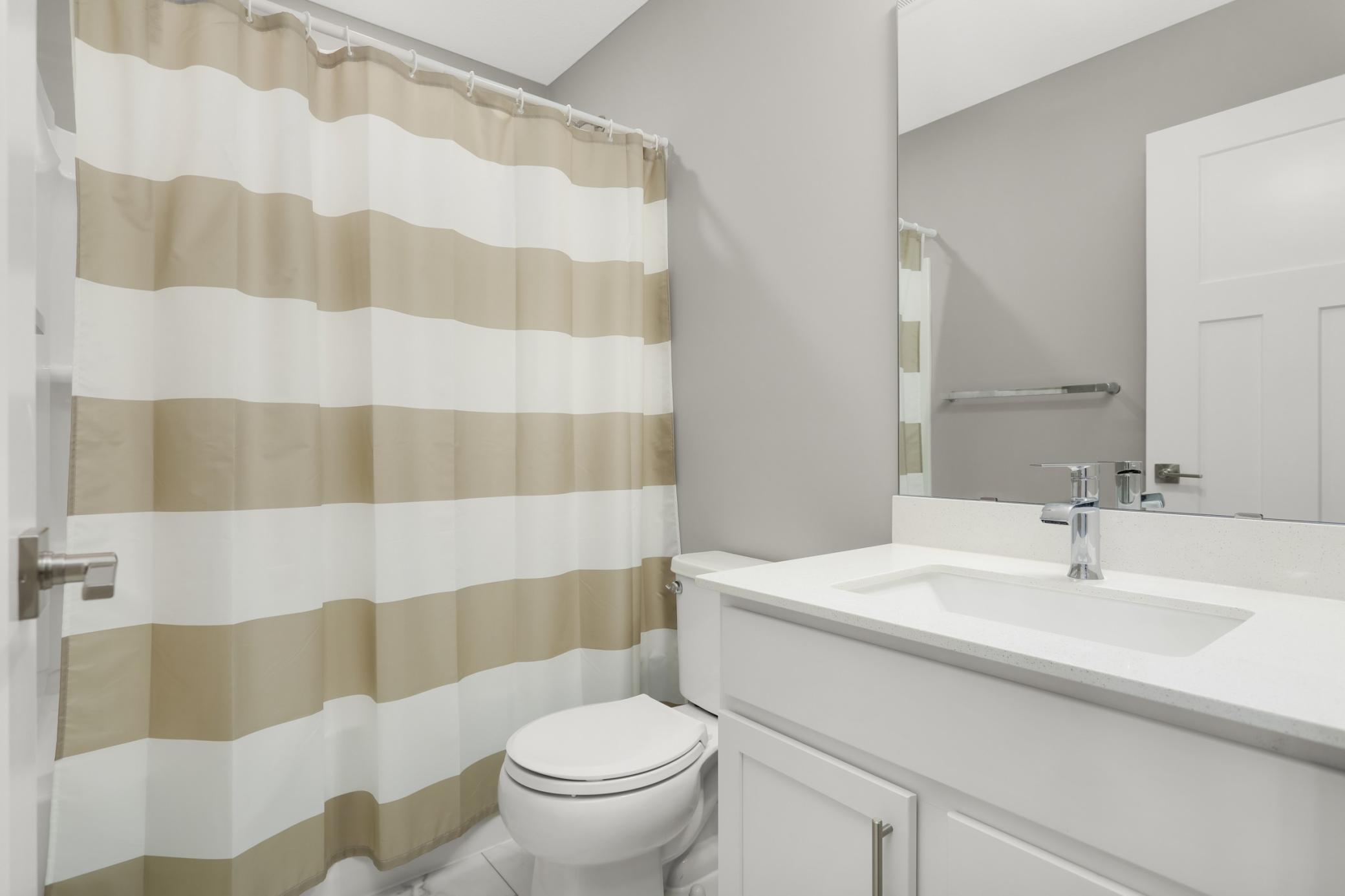 Full guest bath on the upper level.