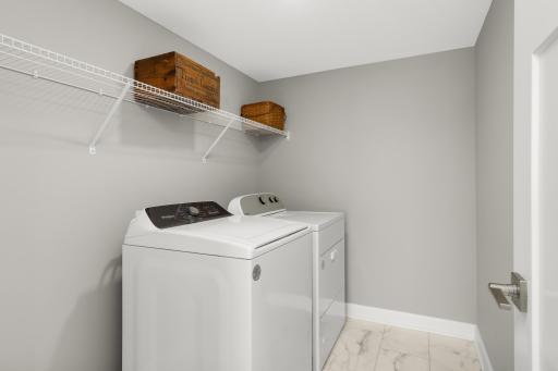 Lower level laundry. Extra storage here, too.