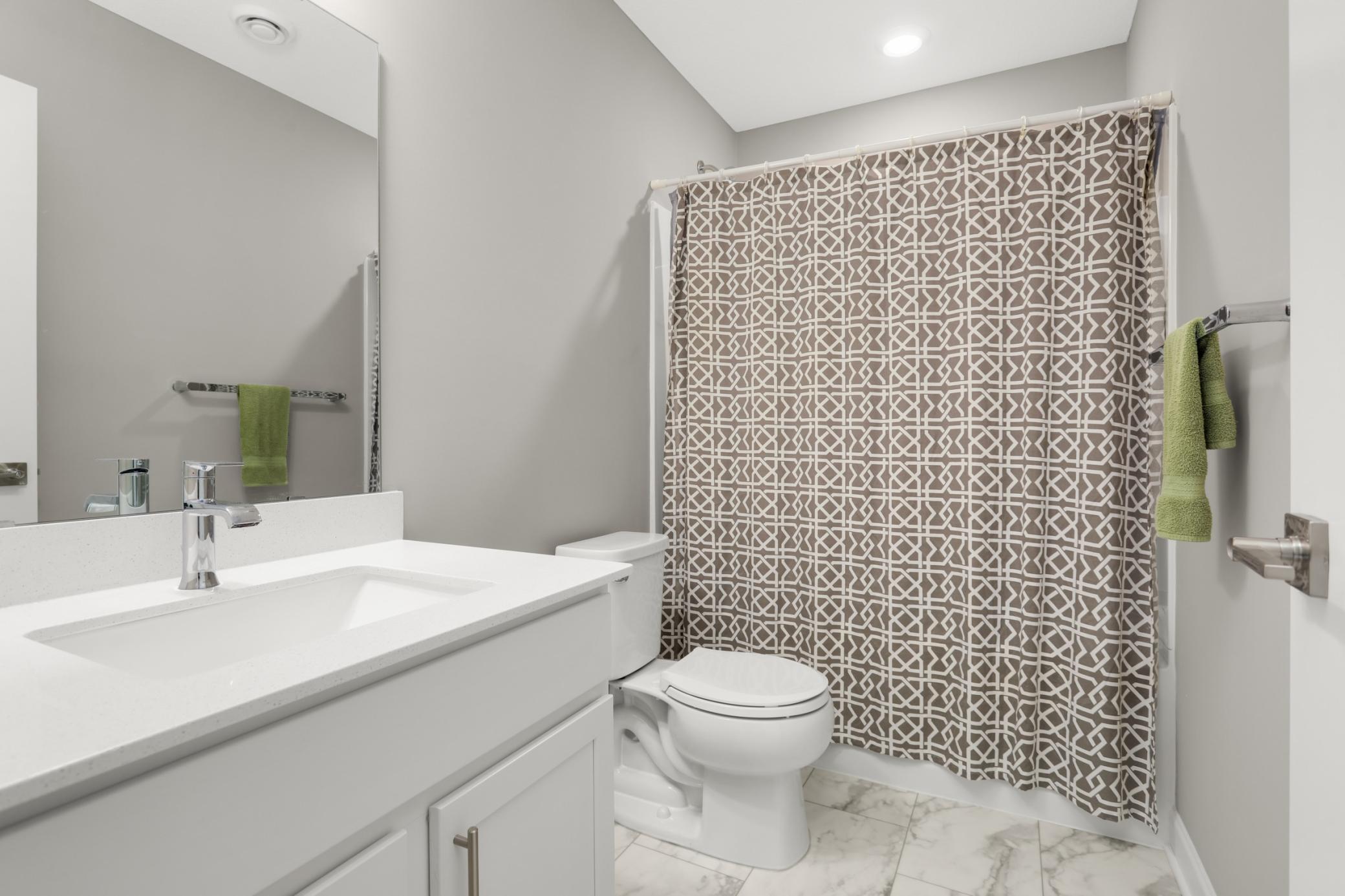 Full bath on the lower level adjacent to Bedroom #4. Perfect for overnight guest stays.