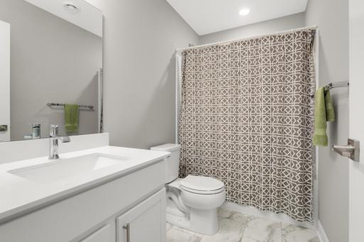 Full bath on the lower level adjacent to Bedroom #4. Perfect for overnight guest stays.