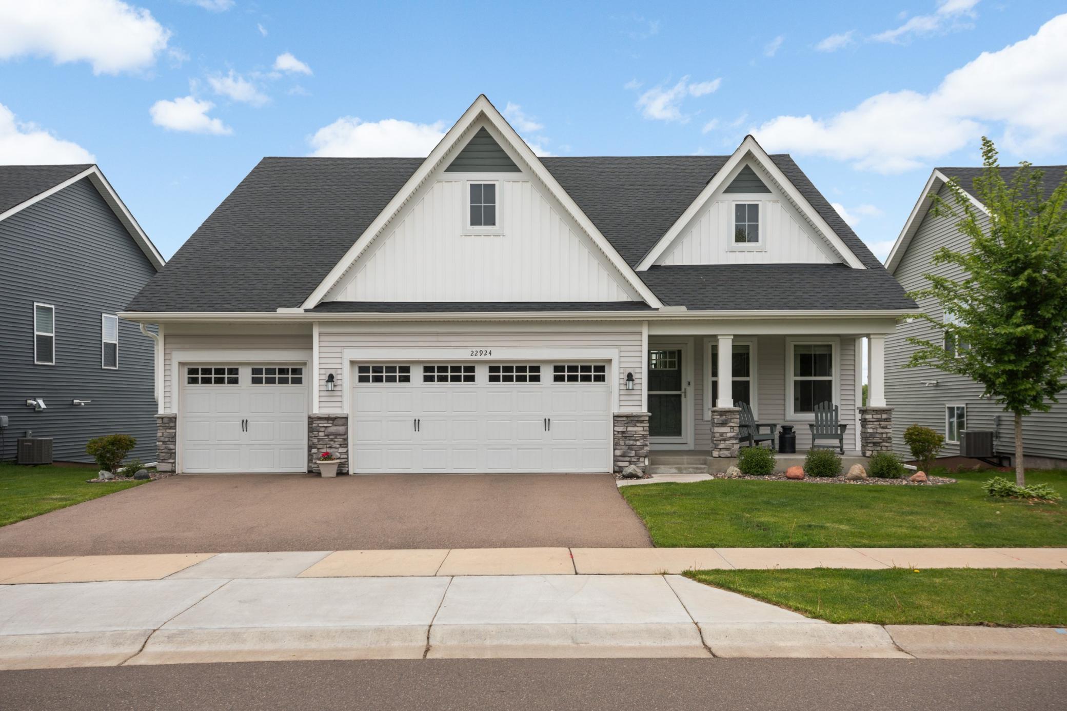 Welcome to 22924 Marie Place in Rogers! This 2022 "Donovan" Model was built by Lennar and looks/feels like new construction