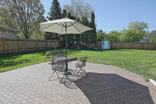 Sliding door leads out to 20' x 20' brick Patio