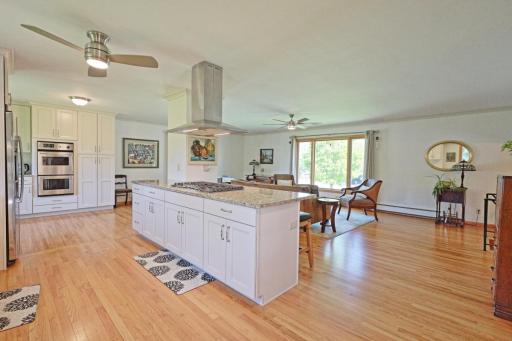 This is a remodeled kitchen that won't feel crowded when guests gather!