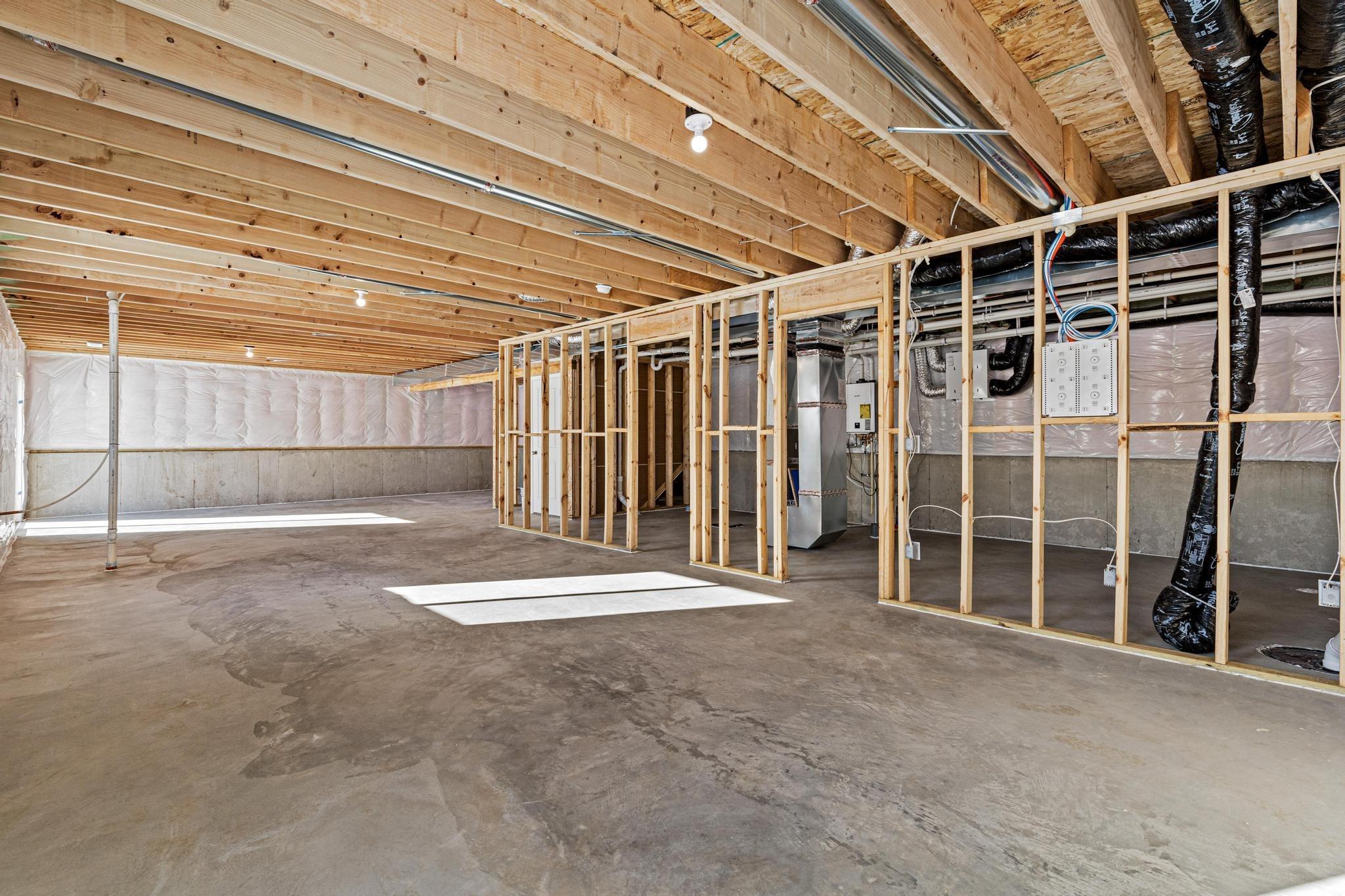 Photo taken of another home with similar plan and finishes. Photos and renderings may not depict actual plan, materials, & finishes may vary. All measurements are approximate.