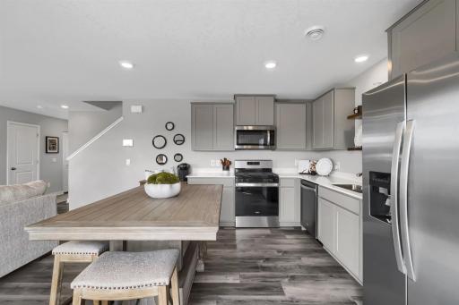 On trend gray cabinets and white Quartz is modern and timeless at the same time.