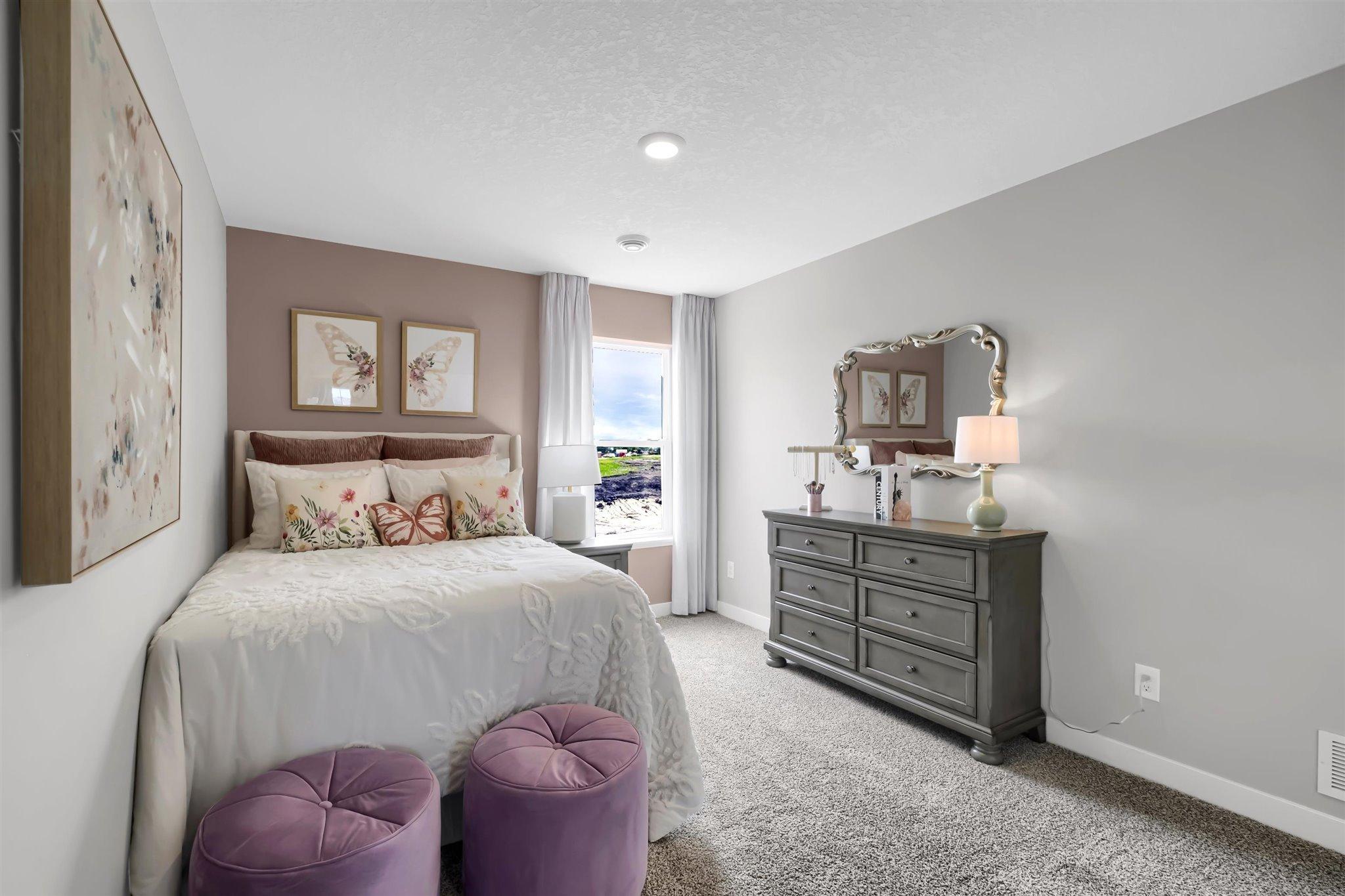 One of 4 spacious upper level bedrooms.
