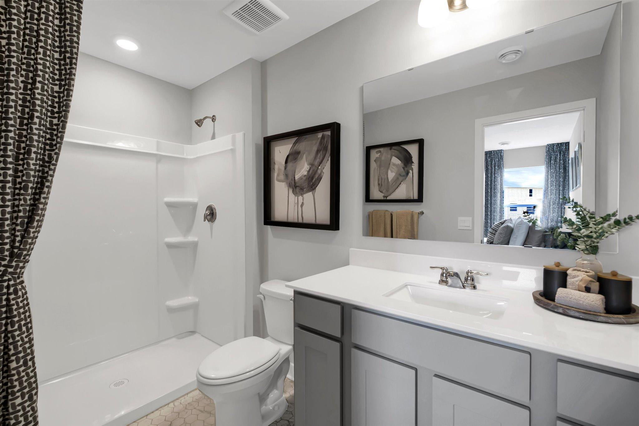Upper level full bathroom.