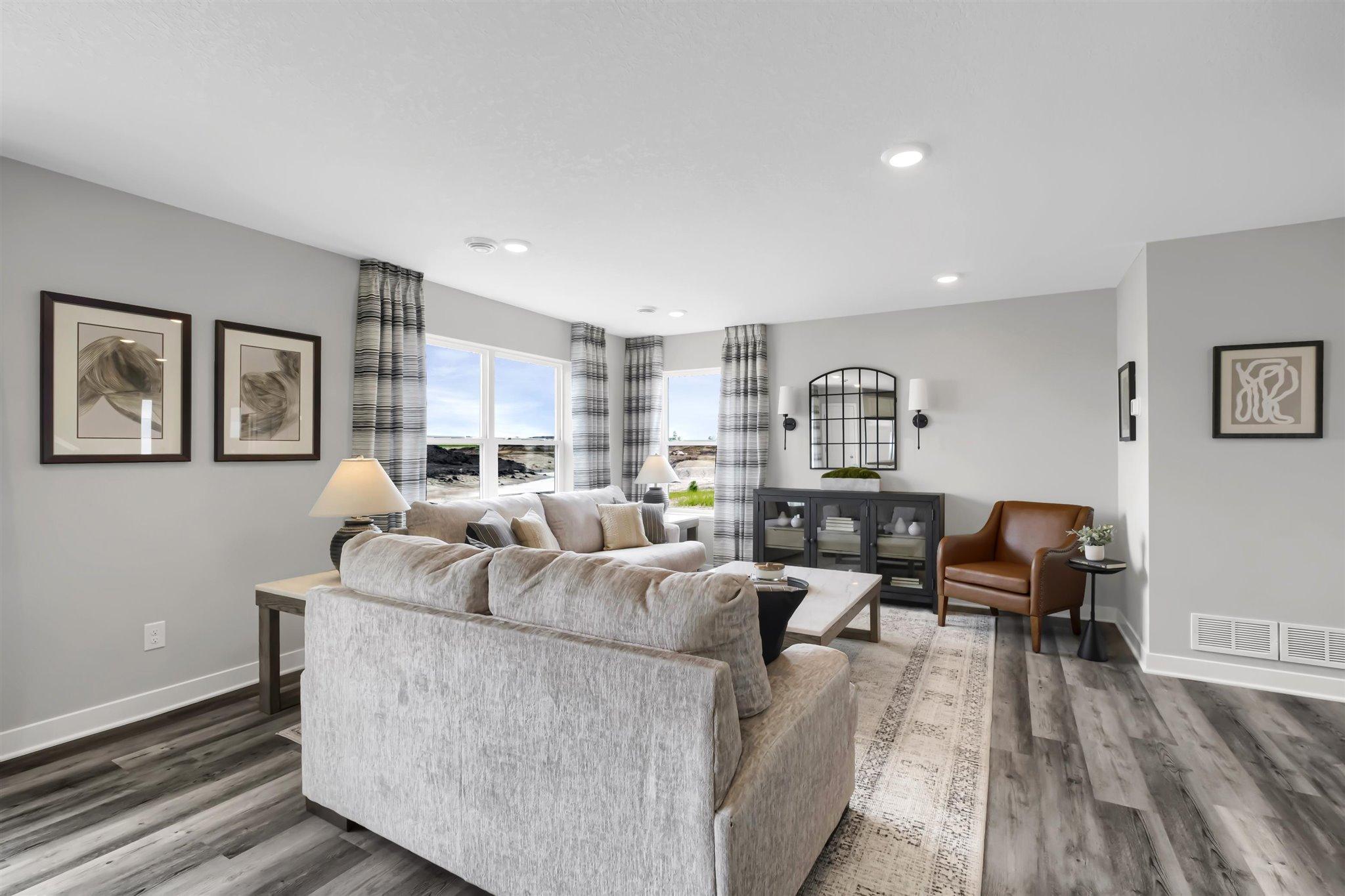 Family room has a cozy feel but offers lots of space.