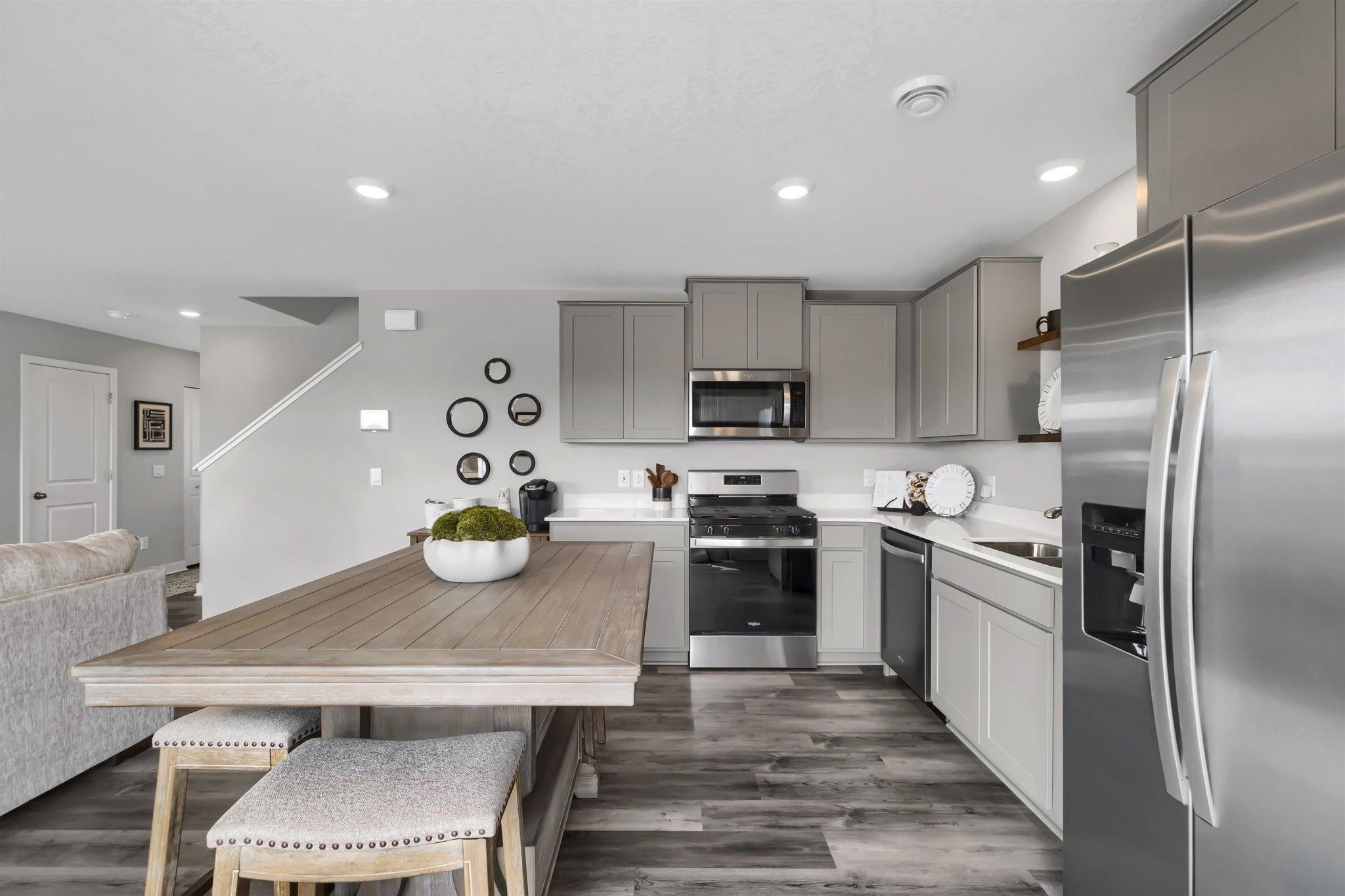 On trend gray cabinets and white Quartz is modern and timeless at the same time.