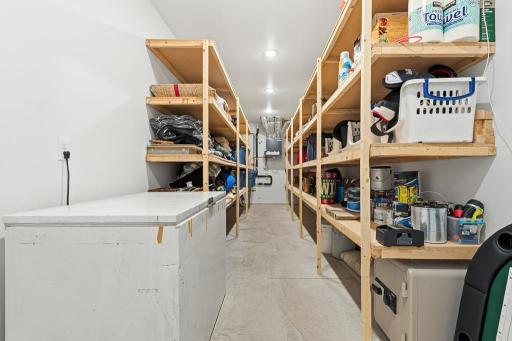 Dedicated storage room complete with shelving and well lit!