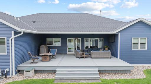 Just as the interior is primed for entertainment, so is the exterior! This spacious partially covered back deck offers an outdoor space to relax rain or shine!