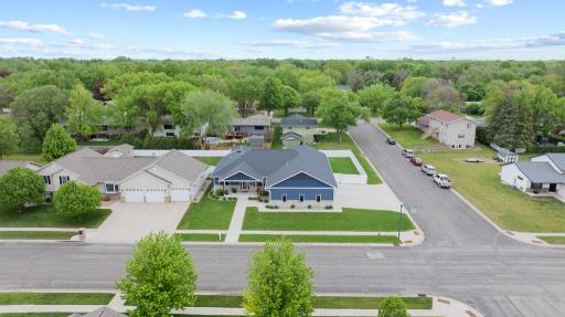 Situated on a spacious corner lot taking advantage of both sides with a welcoming front entry and alternative attached garage driveway and entry