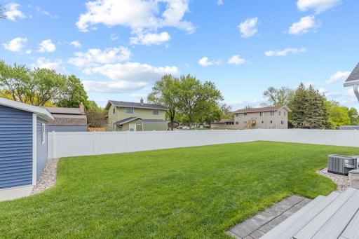 Luscious backyard with in-ground sprinklers