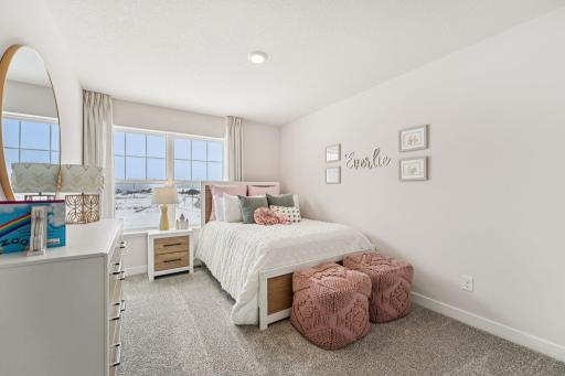 All four bedrooms upstairs are spacious and bright! Photo of model home, color & options will vary.