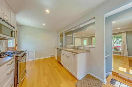 Updated kitchen with new cabinets, SS appliances, quartz counters