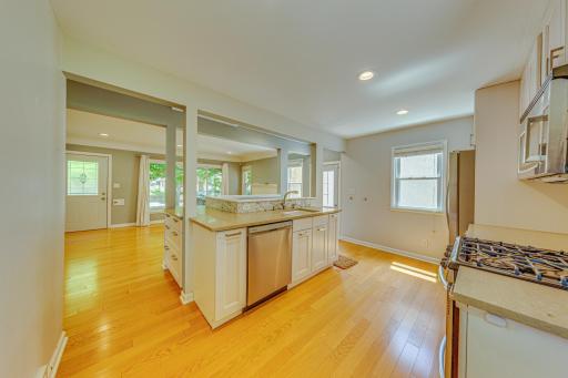 Updated kitchen with new cabinets, SS appliances, quartz counters