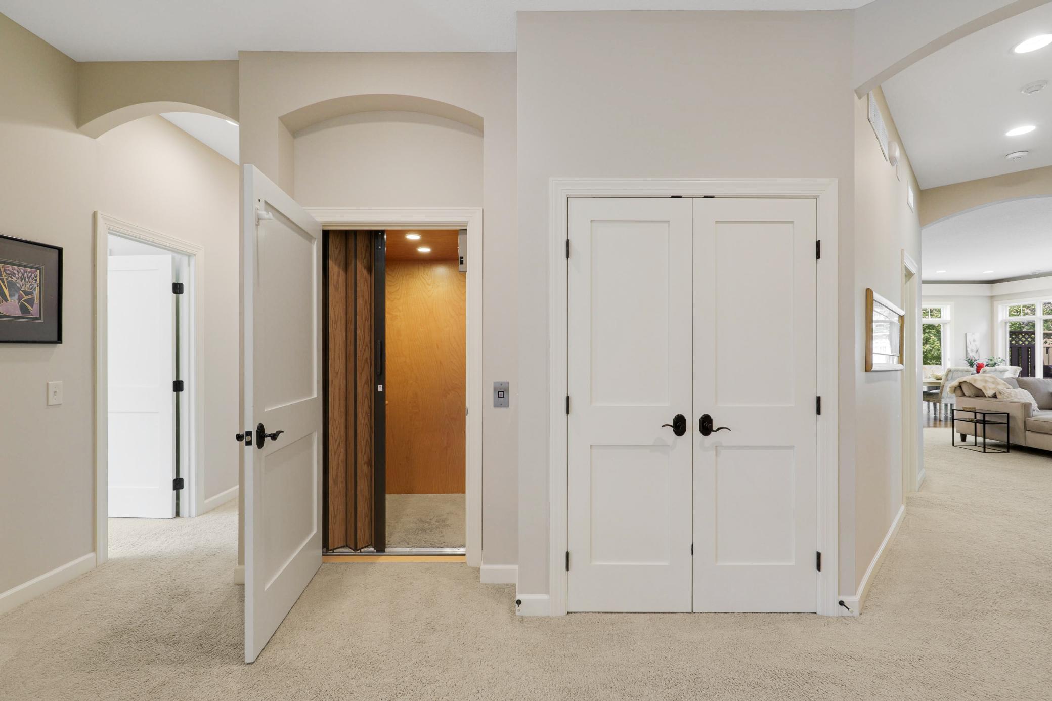 A private elevator provides access to the garage, main floor, and lower level.