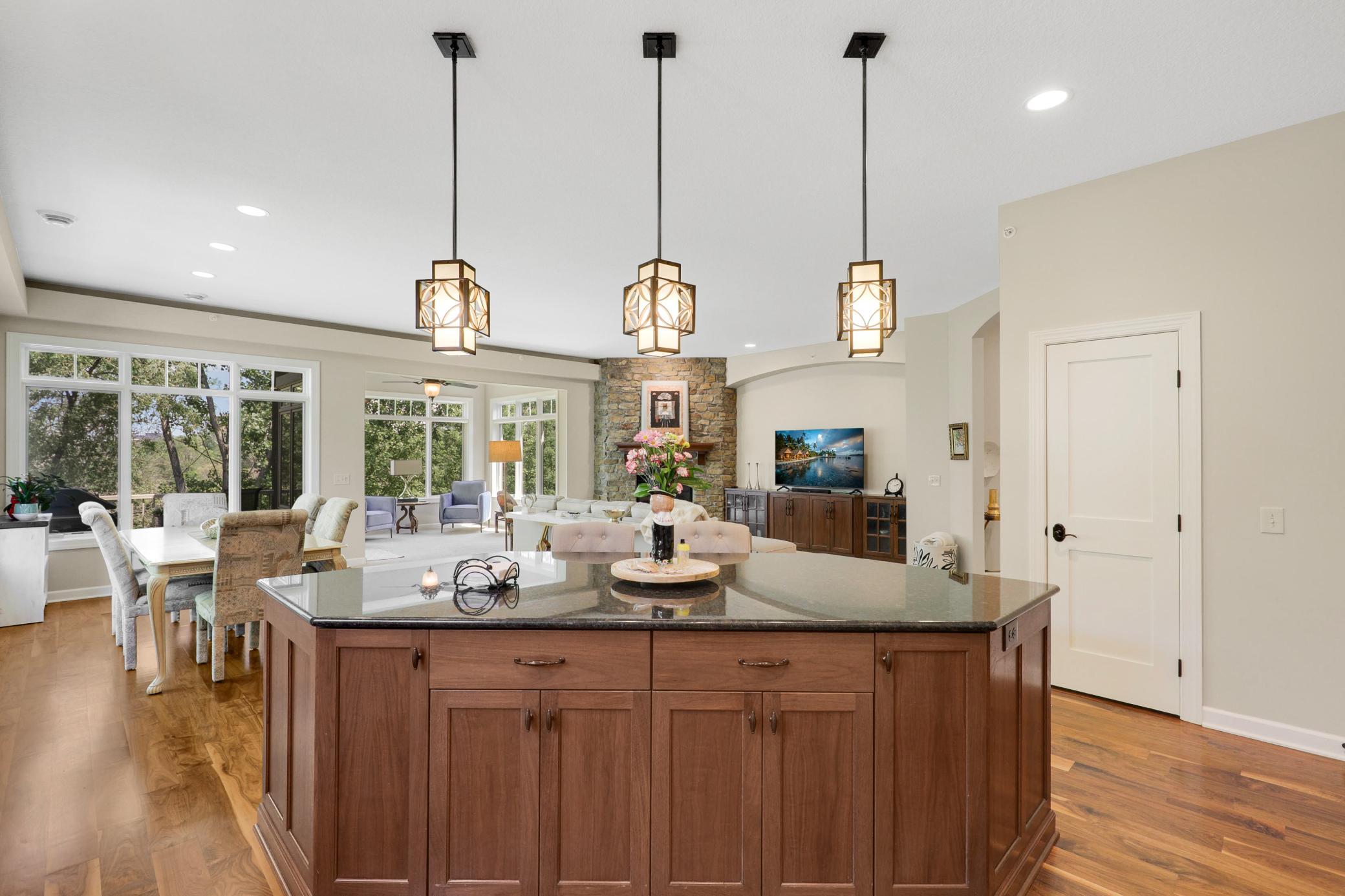 Enjoy cooking in your gourmet kitchen which showcases stone countertops, ample cabinet storage and stainless steel KitchenAid appliances.