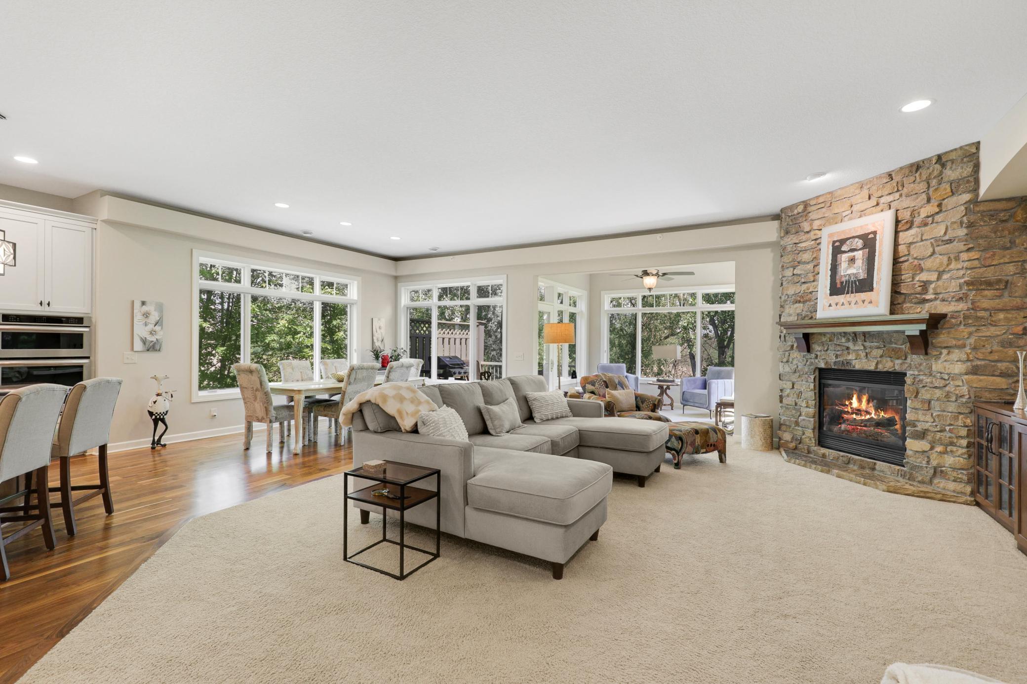 All living facilities, including the primary ensuite, an additional bedroom, living and family rooms, an office/flex space, a dedicated laundry room and more are located on the sprawling main level with 9’ ceilings throughout.