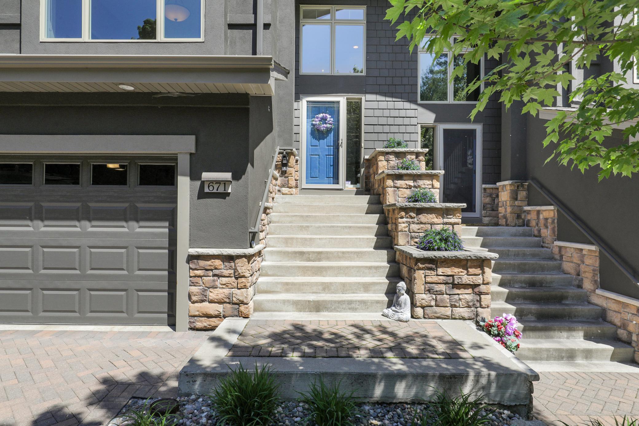 The insulated, finished, tuck-under two-car garage is accessible via the private elevator or stairs from both levels, delivering the perfect blend of luxury, comfort, and lock-and-leave convenience.