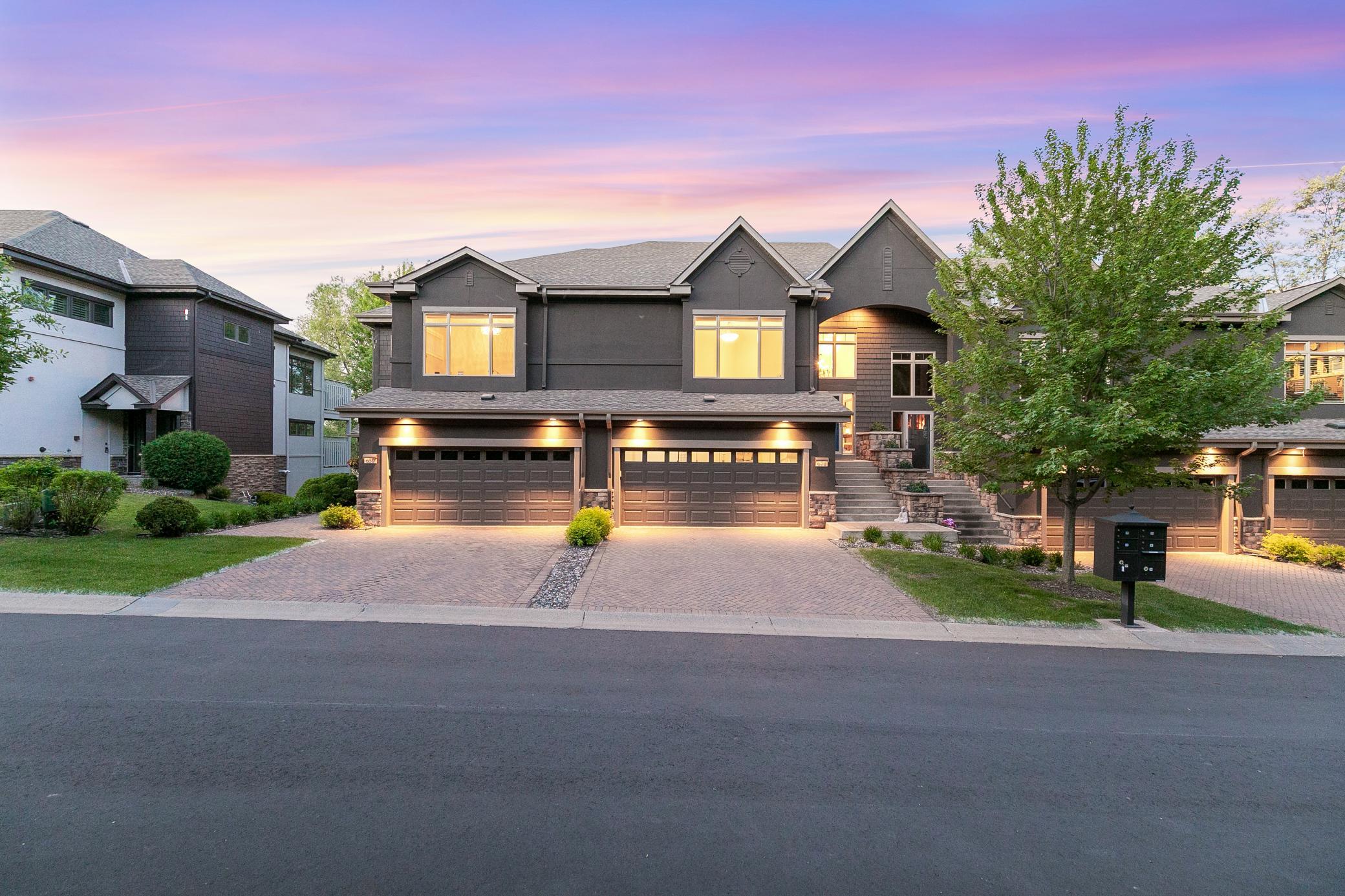 Experience main-level luxury in this supremely located, executive, Willoughby townhome with over 3,700 square feet of refined, open concept living space and a private elevator.