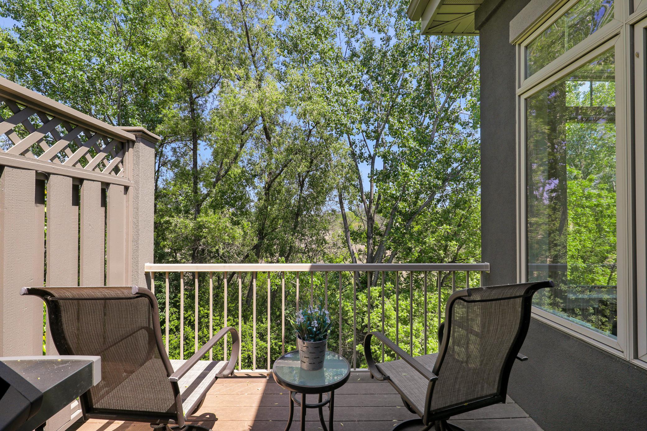Enjoy privacy and nature views with a maturely wooded and vast protected wetland area behind the unit.