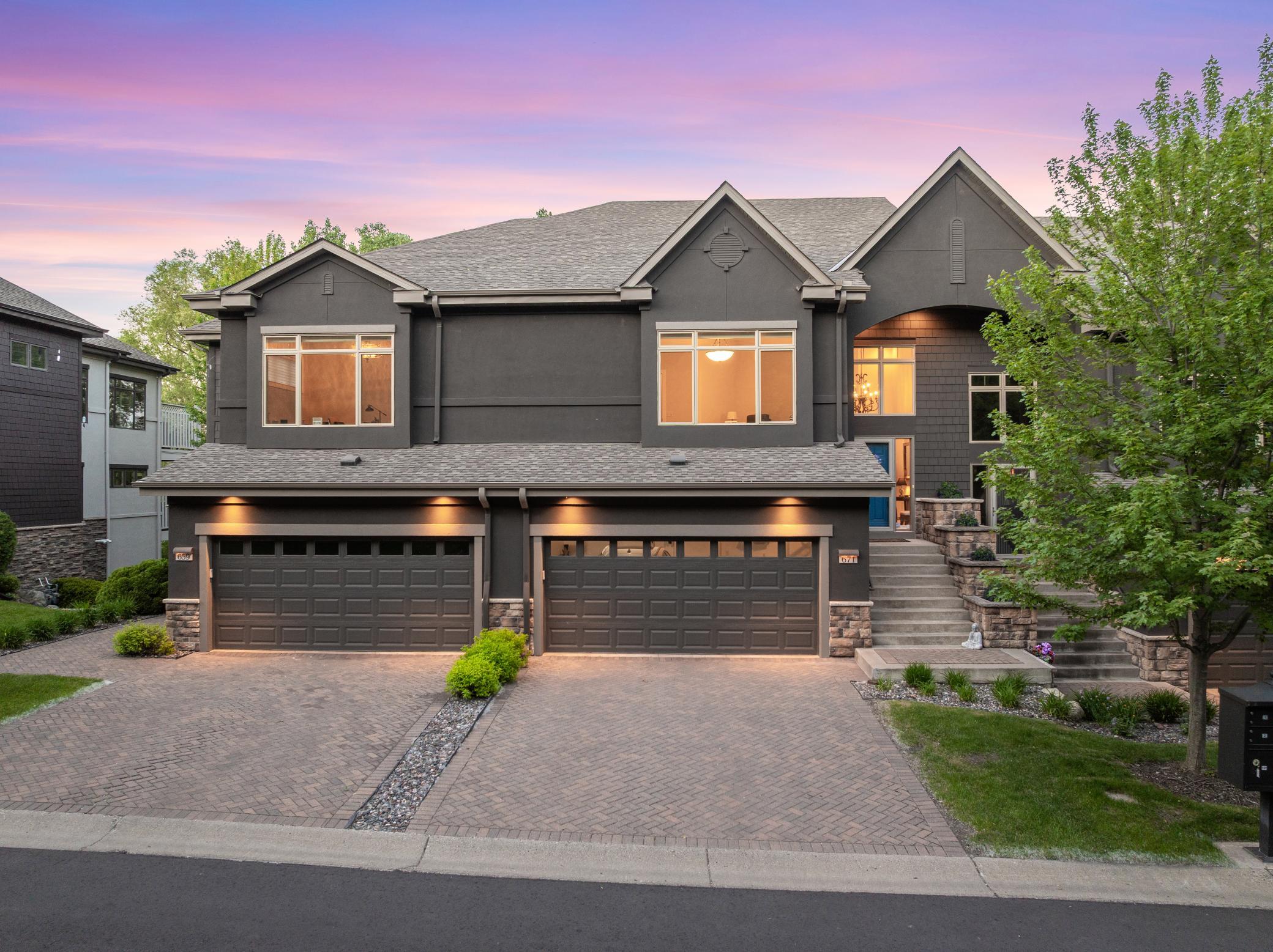 Live simply without sacrificing luxury in this supremely located, executive townhouse with over 3,700 square feet of refined, open concept living space and a private elevator.