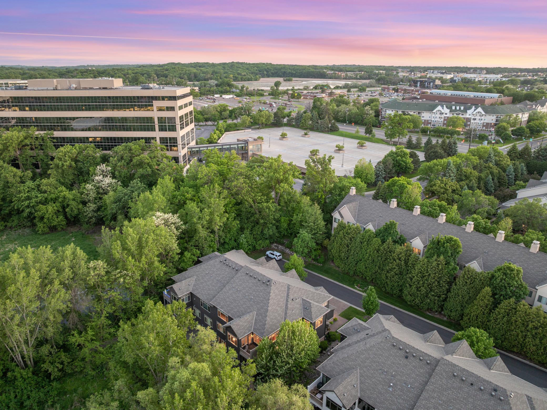 The backyard provides serene views overlooking the maturely wooded and vast, protected wetland area.