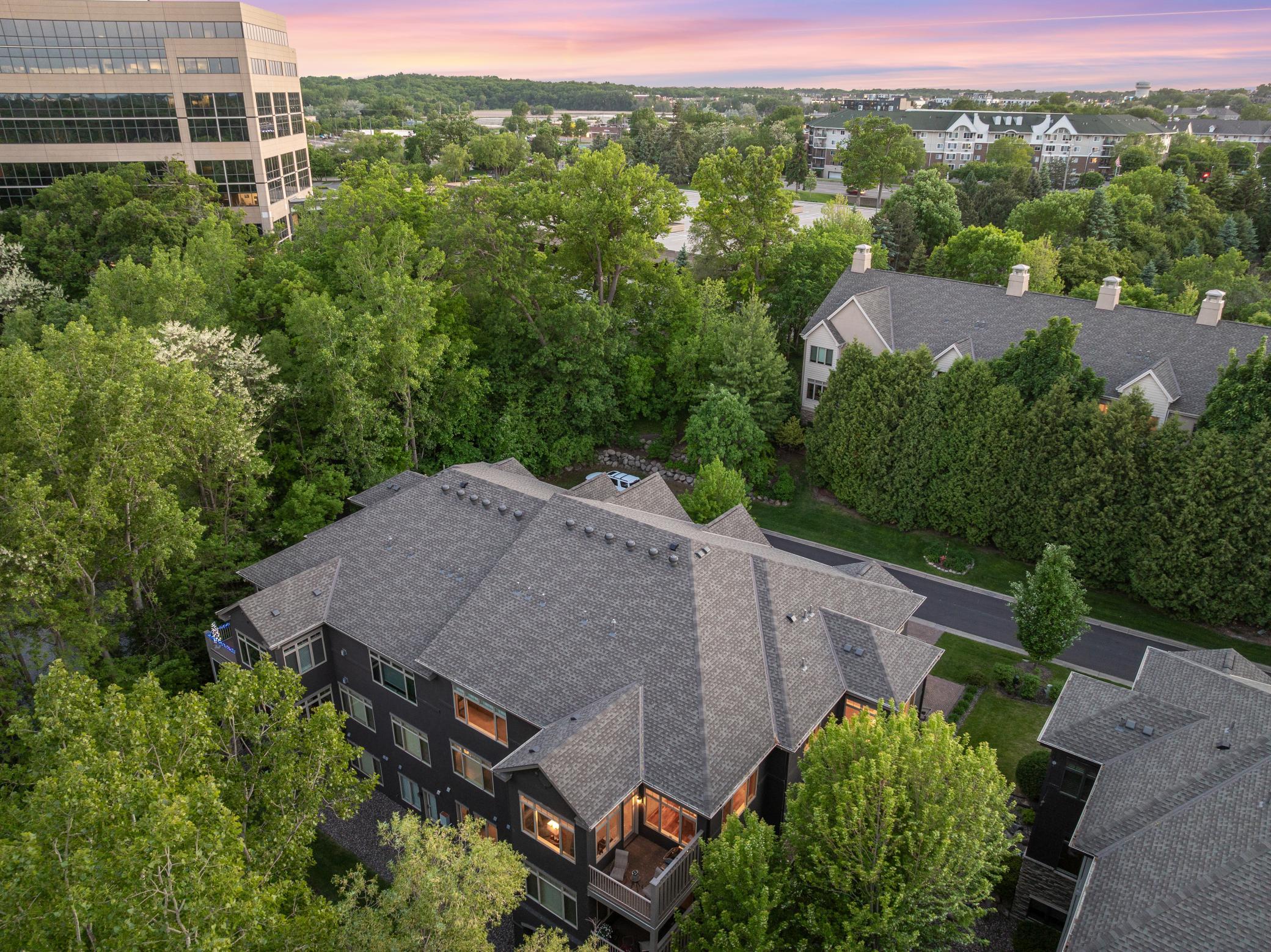 The backyard provides serene views overlooking the maturely wooded and vast, protected wetland area.