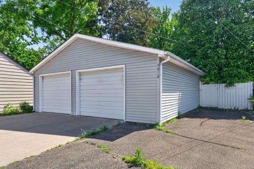 Additional parking space for 2 more cars alongside the garage