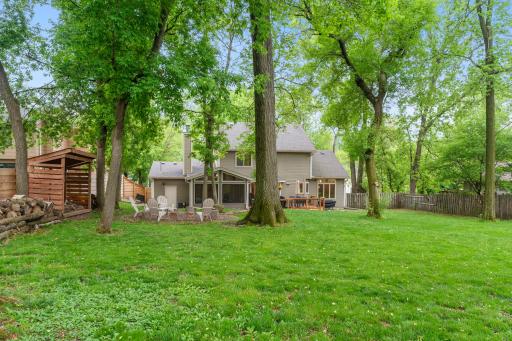 Beautiful mature trees offers a serene retreat with wonderful landscaping.
