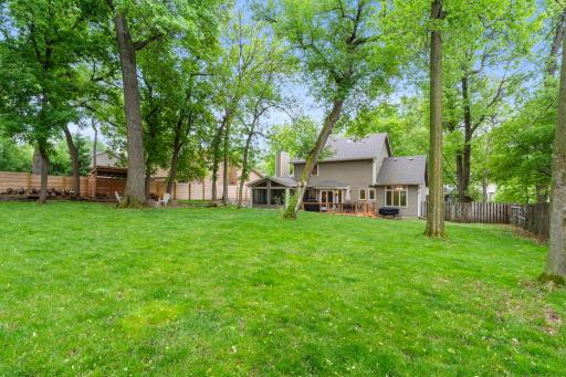 Beautiful mature trees offers a serene retreat with wonderful landscaping.