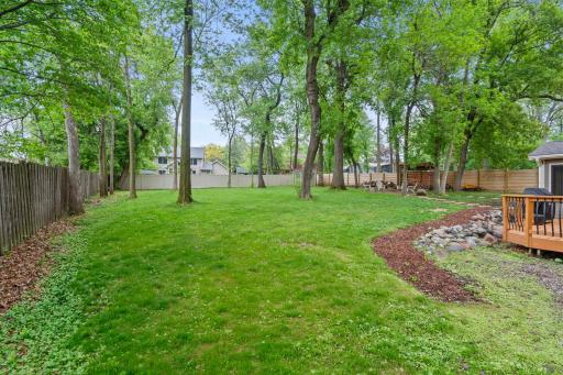 Beautiful mature trees offers a serene retreat with wonderful landscaping.