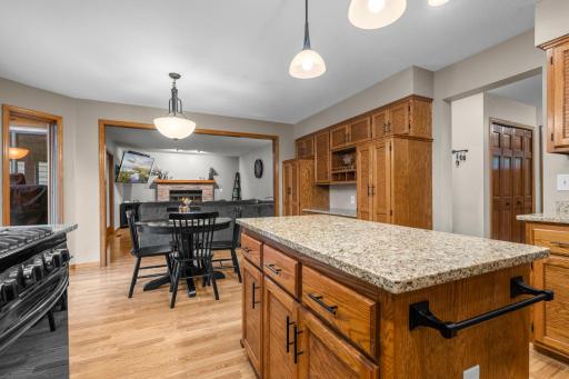 Seamless open floor plan with kitchen open to family room.