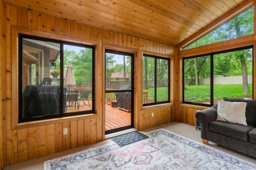 3 season porch walks out to deck and private backyard.