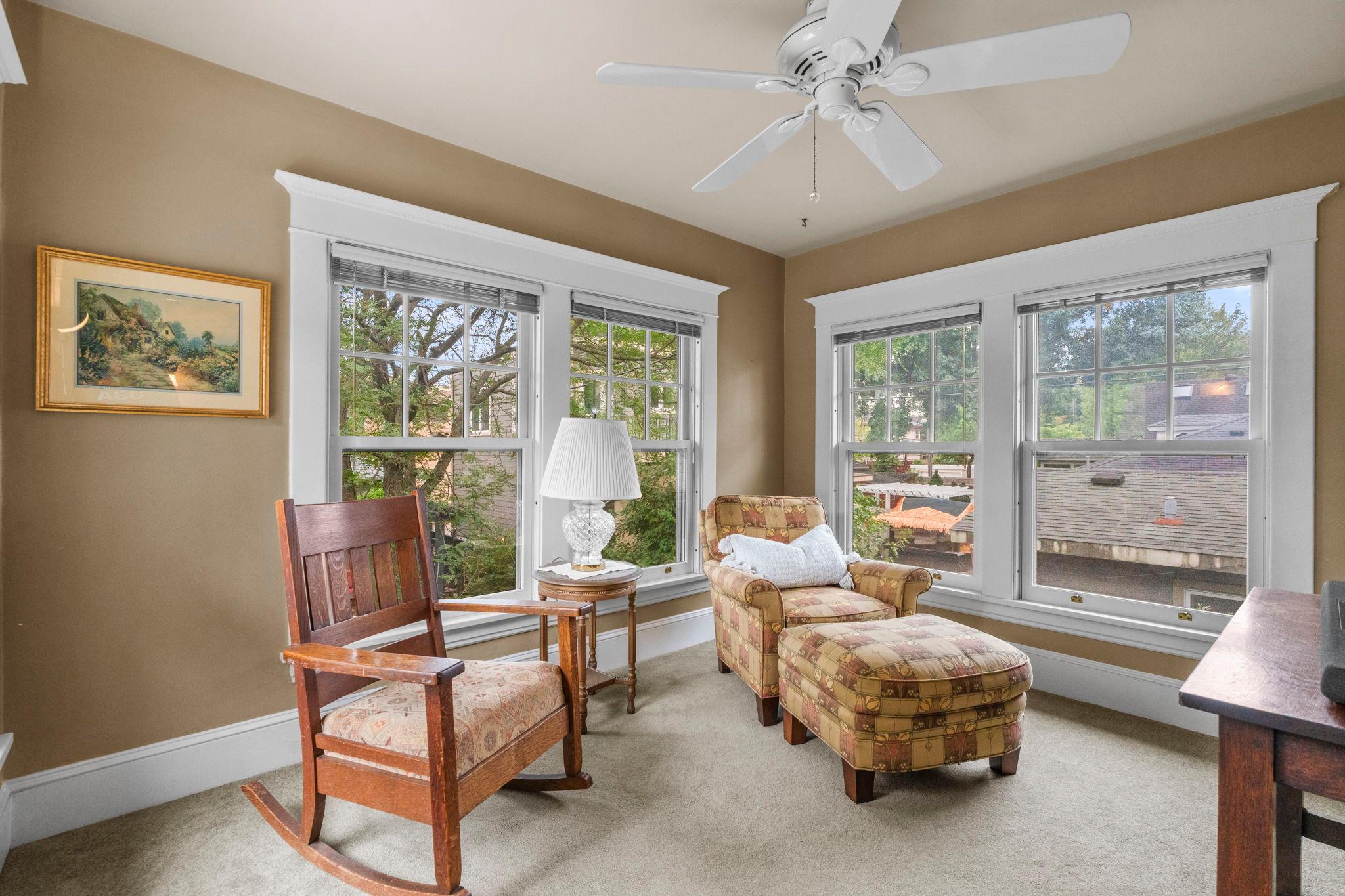 The adjoining room, which overlooks the backyard, can serve as an office, workout space or sitting room.