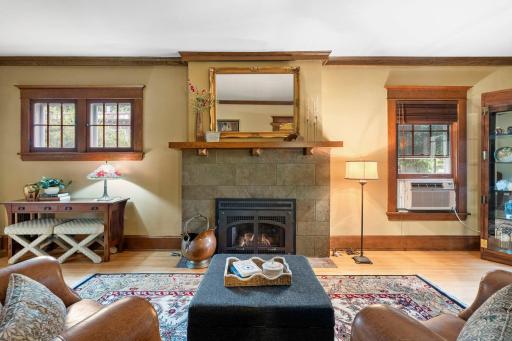 The original fireplace facade has been restored and a gas insert installed. Perfect for enjoying winter evenings.