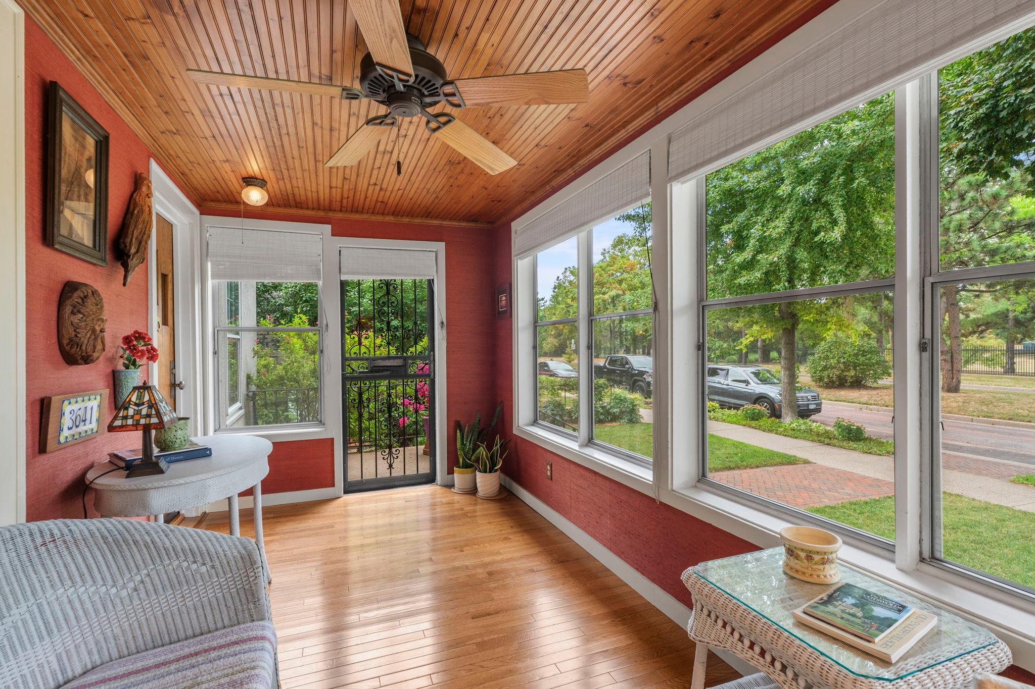 Solid oak floors, a charming beadboard ceiling and grasscloth wallcoverings are some of the room's distinctive touches
